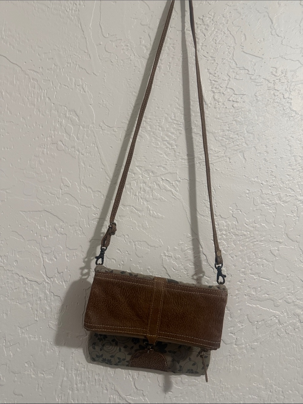 Maya Brown Leather Fold-Over Crossbody with Floral Accent